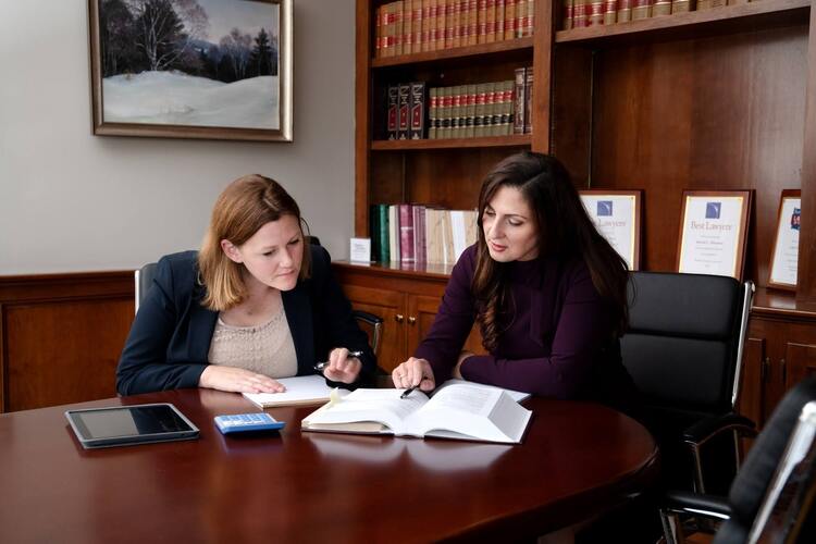 Shaheen & Gordon trusts, estates, and guardianship lawyers having a discussion - How to choose an estate planning attorney