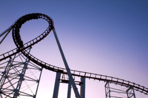 Roller coaster at dusk - theme park injury lawyer